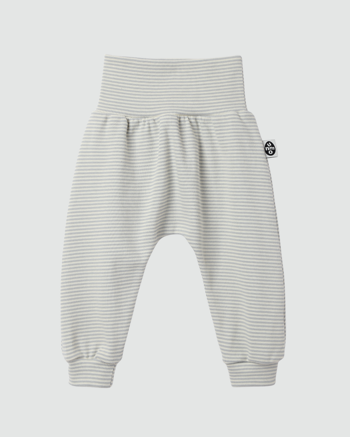 A pair of baby jogger pants with a high-waisted elastic waistband, featuring fine horizontal stripes in light gray and white. A small circular black and white logo tag is visible on the left hip.